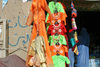 Afghanistan - Herat province - shop with girls' clothes with two women in burkas shopping - photo by E.Andersen