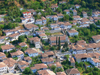 Berat, Albania: red roofs - church and surrounding houses - UNESCO world heritage - photo by J.Kaman