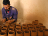 Algeria / Algerie - M'chouneche - Biskra wilaya: pottery workshop - potter at work - vases - photo by J.Kaman