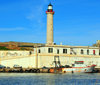 Cherchell - Tipasa wilaya, Algeria / Algrie: lighthouse and harbour facilities | phare et installations portuaires - photo by M.Torres