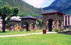 Andorra - Encamp: perspective at Parc del Prat Gran - public park - field stone and Romanesque arches, traditional in Pyreneean architecture - photo by M.Torres