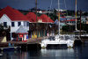 Antigua - St John's: catamaran under your veranda (photo by S.Young)