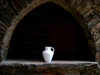 Israel - white vase in stone arch (image by Efi Keren)