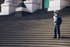 Australia - Melbourne (Victoria): policeman standing guard - Victoria Parliament house - photo by Picture Tasmania/Steve Lovegrove
