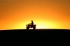 Australia - Stockton (NSW): quad bike silhouette at sunset - ATV - All-terrain vehicle - photo by Rod Eime
