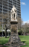 Australia - Adelaide (SA): Statue of John McDouall Stuart at Victoria Square. Inscription reads John McDouall Stuart, Explorer, Adelaide to Indian Ocean 1861-2 - photo by R.Zafar