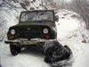 Azerbaijan - outside Quba: snow chains being put on a UAZ jeep - road to to Xiniliq (photo by Austin Kilroy)
