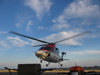 Caspian sea - Sikorsky S-76A helicopter landing on oil rig - East West Helicopters - Central Azeri section of Azeri-Chirag-Gunashli oil field - aircraft - photo by L.McKay