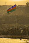 Azerbaijan - Baku: Azerbaijani flag and Baku bay - sunset (photo by Miguel Torres)