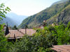 Azerbaijan - Saribash - Qax rayon - ruins, mountains and minaret  - photo by F.MacLachlan