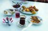 Azerbaijan - Baku: Azeri tea in an armud - pear shapped glass, with jam and nuts - photo by G.Frysinger