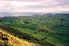 Azores / Aores - Terceira - Feteira - concelho de Angra do Herosmo: manta de retalhos de campos vistos da Serra do Cume - ilhus das Cabas ao fundo / the chequered fields from Serra do Cume - photo by M.Durruti