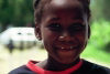 Barbados -  Bridgetown: portrait of a school girl (photo by Michael Gunselman)