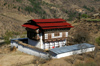 Bhutan - Large Bhutanese house on the way to the Haa valley, near Paro - photo by A.Ferrari