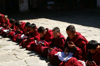 Bhutan - line of monks having lunch, in Haa Trasang - photo by A.Ferrari