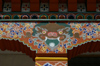 Bhutan - Thimphu - demon - painting on support column - city center - photo by A.Ferrari