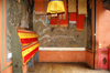 Bhutan - colourful prayer flags and old paintings, inside Tango Goemba - photo by A.Ferrari