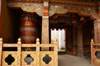 Bhutan - Wood carvings and prayer wheel, inside Tango Goemba - photo by A.Ferrari