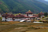 Bhutan - Thimphu - rice paddies and Trashi Chhoe Dzong - photo by A.Ferrari