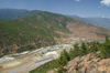 Bhutan - Paro: PBH - Paro airport and its (short) runway, seen from a nearby hill - the only airport in Bhutan - photo by A.Ferrari