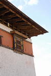 Bhutan, Paro: Detail Paro Dzong - window and roof - photo by J.Pemberton