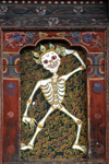 Bhutan, Thimphu: Detail Trashi Chhoe Dzong - dancing skeleton - photo by J.Pemberton