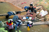 Brazil / Brasil - Lbrea - aldeia Pedreira: river laundry - Kaxarari indians - lavando a roupa no rio (photo by M.Alves)