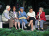 Bulgaria - Sofia: Retired people chatting on a bench in Yuzhen Park - elderly people (photo by J.Kaman)