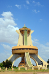 Ouagadougou, Burkina Faso: Martyr's Monument aka Monument to the National Heroes, central element of Place de l'Afrique, Ouaga 2000 quarter - a short version of the Eiffel tower, built in concrete - Monument des Martyrs / Mmorial aux Hros nationaux - photo by M.Torres