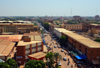 Ouagadougou, Burkina Faso: city center skyline along Maurice Yameogo avenue, the commercial heart of the city - the Central Market on the left and the Grand Mosque on the right - photo by M.Torres