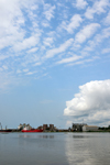 Cameroon, Douala: harbor scene - freighter ship and port installations in the Wouri river estuary - silos and warehouses - Douala harbor handles most of the country's imports and exports - photo by M.Torres