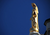 Montreal, Quebec, Canada: gilded statue of Our Lady of Lourdes atop the faade of the Chapelle Notre-Dame de Lourdes - architect Napolon Bourassa - Rue Ste-Catherine Est, Quartier Latin - photo by M.Torres
