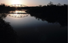 Canada / Kanada - Saskatchewan - Moose Jaw: brilliant sunset over a truss bridge - photo by M.Duffy