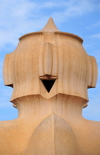 Barcelona, Catalonia: Buddha-like head of an access tower, roof of Casa Mil, La Pedrera, by Gaudi - UNESCO World Heritage Site - photo by M.Torres