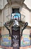 Barcelona, Catalonia: art nouveau lamp and tiles - Farmacia Laboratorio, corner of Carrer del Bruc and Ronda de Sant Pere - photo by M.Torres