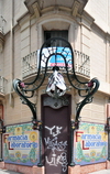 Barcelona, Catalonia: art nouveau lamp and tiles - Farmacia Laboratorio, corner of Carrer del Bruc and Ronda de Sant Pere - photo by M.Torres