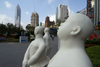 Shanghai, China: Nanjing Road - white statues - pedestrianised area - photo by Y.Xu