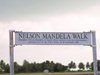 Cocos islands / Keeling islands / XKK - West Island: Nelson Mandela Walk - sign - photo by Air West Coast