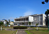 Brazzaville, Republic of Congo: French colonial building of the the City Hall - Hotel de Ville / Mairie - facade seen from architecture by Jean Yves Normand - Mairie Centrale de Brazzaville - Pierre Savorgnan de Brazza Memorial on the left - Avenue Amilcar Cabral, Quartier de la Plain, Poto-Poto - photo by M.Torres