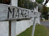 Cook Islands - Rarotonga island:  Avarua - old wooden road sign - Makea Tinirau Rd - photo by B.Goode