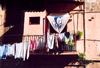 Corsica - Bastia: WC on the balcony - hanging toilet - laundry drying - photo by M.Torres