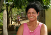Cuba - Holgun province - mother with pink shirt, daughter in the background - photo by G.Friedman