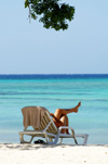 Cuba - Guardalavaca - Relaxing by beach with tree at top - Every travel brochure can use this image. It represents travel, relaxation, and a leisurely lifestyle - photo by G.Friedman