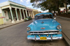 Cuba - Holgun - a 1953 Chevy Bel Air Blue and street - photo by G.Friedman