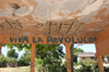 Cuba - Holgun province - bus stop graffiti - Viva la Revolution - photo by G.Friedman