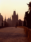 Czech Republic - Prague: early morning - Charles Bridge, the most famous bridge in Prague, built by King Charles IV- the statues are silhouetted against the light of sunrise - started by Master Otto and finished by Peter Parler in 1402 - photo by J.Fakete