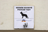 Public dog tie on a building in Prague. Czech Republic - photo by H.Olarte