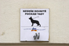 Public dog tie on a building in Prague. Czech Republic - photo by H.Olarte