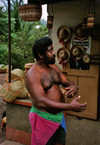 Dominica: local man at a shop, descendent of Caribe Amerindians - photo by G.Frysinger