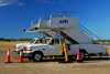 Punta Cana, Dominican Republic: AVIAM ground services passenger boarding stairs (air-stairs) on Ford F-380 trucks - Punta Cana International Airport - PUJ / MDPC - photo by M.Torres